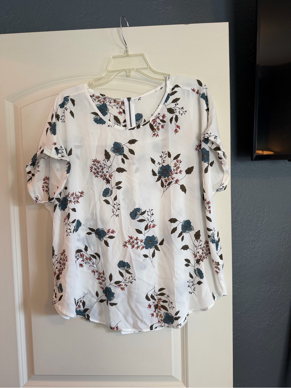 Maurice’s White Short Sleeve Blouse with Blue Floral Details